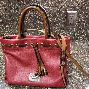Dooney Bourke brick red bag w/ crossbody strap